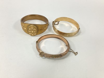 Lot 188 - A Victorian Gilt Metal Hinged Bangle, with...