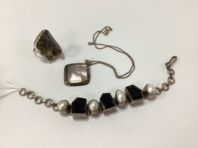 Lot 157 - A Modern Collet Set Bracelet, with alternating...