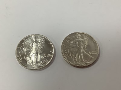 Lot 57 - Two USA 1oz Fine Silver Coins, 1990 and 1993.