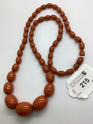 Lot 215 - A Single Strand Graduated Amber Colour Bead...
