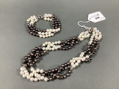 Lot 208 - A Modern Black and White Fresh Water Pearl...