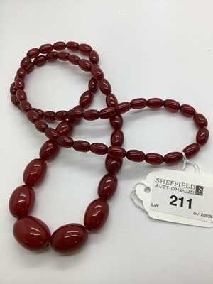 Lot 211 - A Single Strand Graduated Cherry Amber Colour...