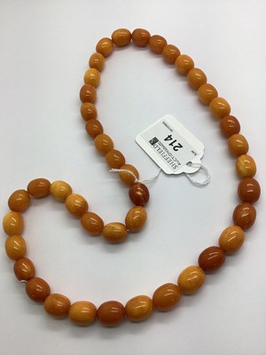 Lot 214 - A Uniform Single Strand Amber Colour Bead...