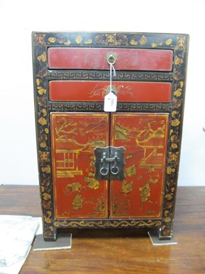 Lot 1582 - A Chinese Black Cabinet, with two red lacquer...