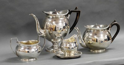 Lot 102 - A Georgian Hallmarked Silver Four Piece Tea...