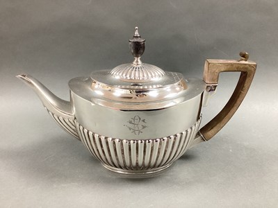 Lot 69 - An Edwardian Hallmarked Silver Teapot, Messrs...