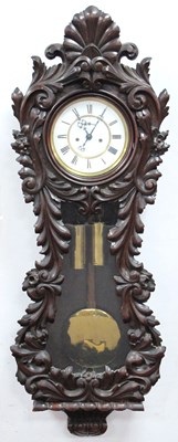 Lot 1530 - A Late XIX Century Wall Clock, the stained...