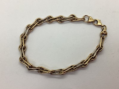 Lot 187 - A Fancy Link Bracelet, of two tone openwork...