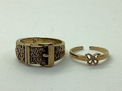 Lot 172 - A 9ct Gold Buckle Style Ring, of part bark...