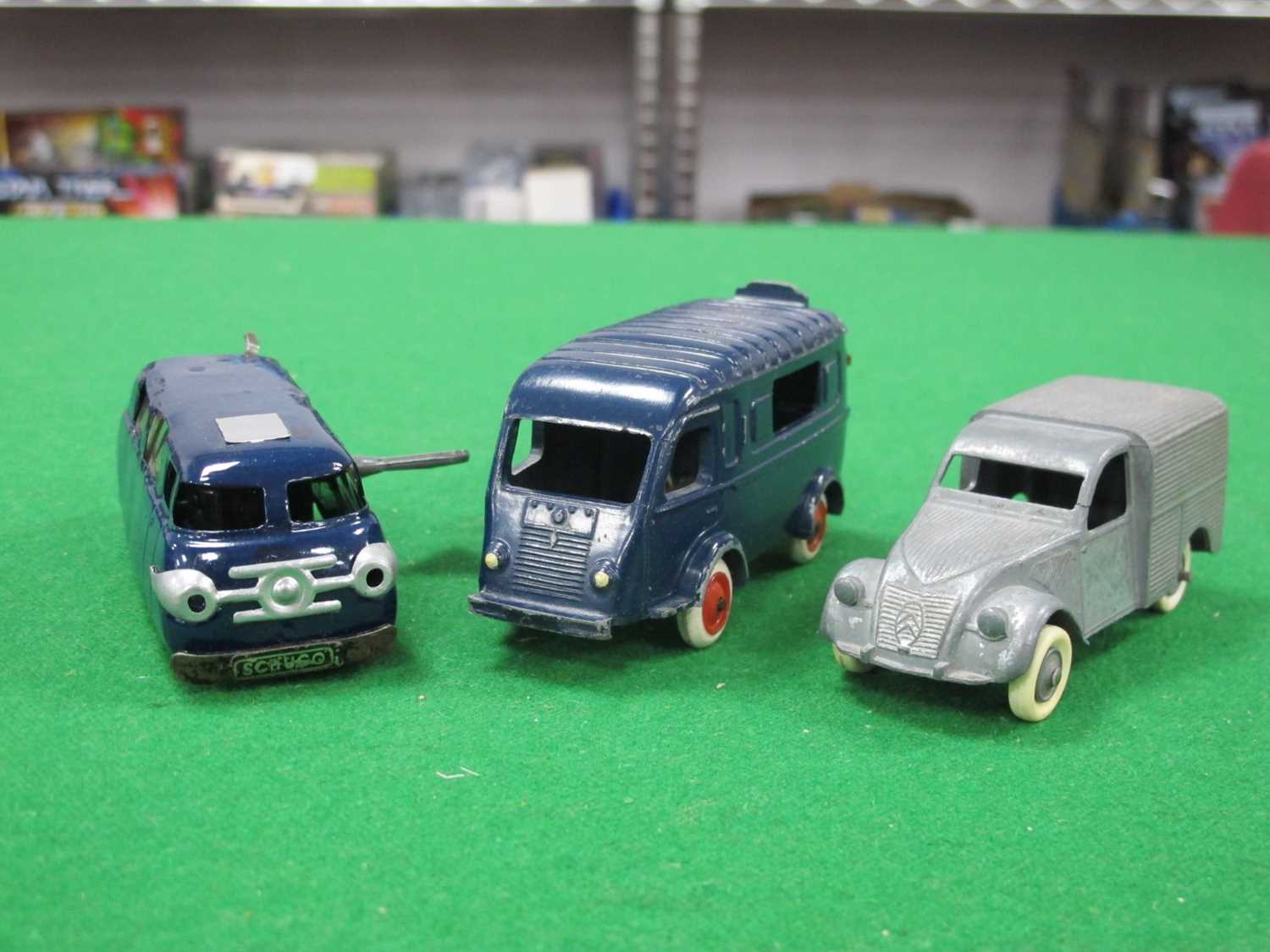 Lot 608 - Three diecast and tinplate model vehicles to