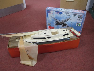 Lot 325 - A Plastic R/C Pond Yacht, requiring attention...