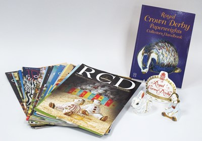 Lot 1043 - A Royal Crown Derby Porcelain Paperweight...