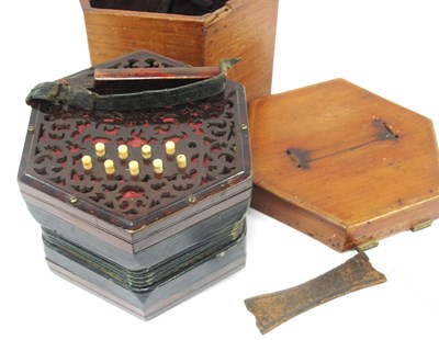Lot 1354 - A Lachenal and Co. Concertina, with twenty...