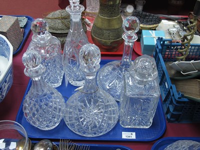 Lot 1341 - A collection of six glass decanters three...