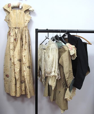 Lot 1378 - A Circa 1830's Cream Silk Gown, striped and...