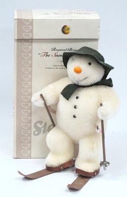 Lot 1112 - A Steiff Figure 'The Snowman Skiing', in white...