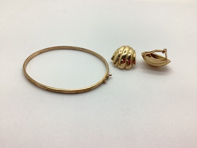 Lot 226 - A 9ct Gold Bangle, with safety clasp, together...