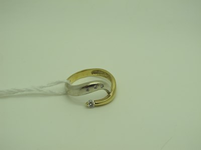Lot 348 - A Modern Two Colour Dress Ring, inset and claw...