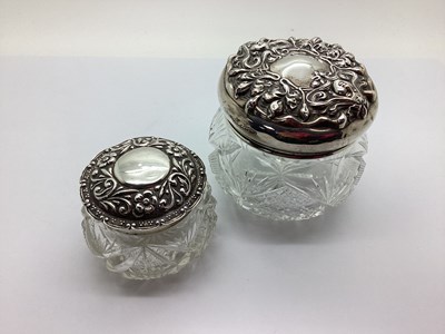 Lot 108 - A Hallmarked Silver Topped Glass Dressing...