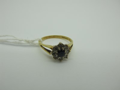 Lot 342 - An 18ct Gold Cluster Ring, of flower head...