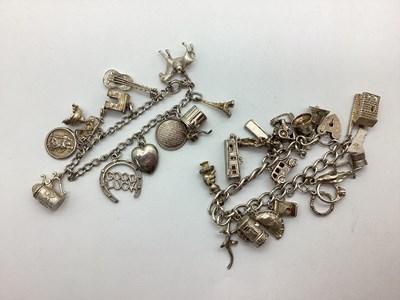 Lot 204 - A Curb Link Charm Bracelet, to heart shape...