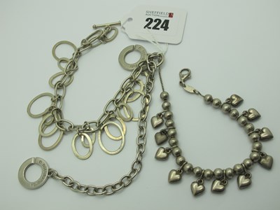 Lot 224 - Three Modern "925" Bracelets, including Hot...