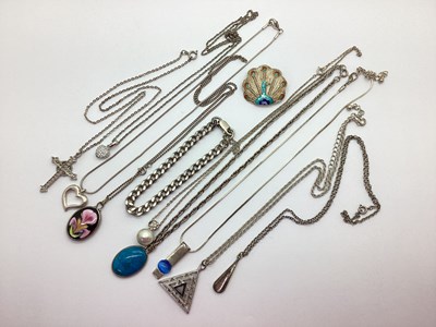 Lot 207 - Assorted Pendants on Chains, a curb link...