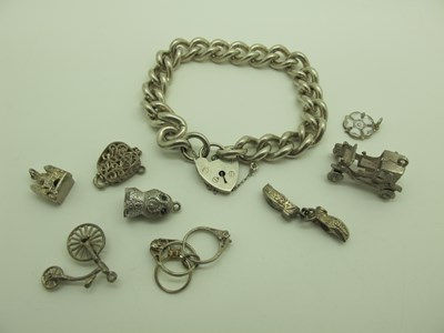 Lot 181 - A Hallmarked Silver Curb Link Charm Bracelet,...