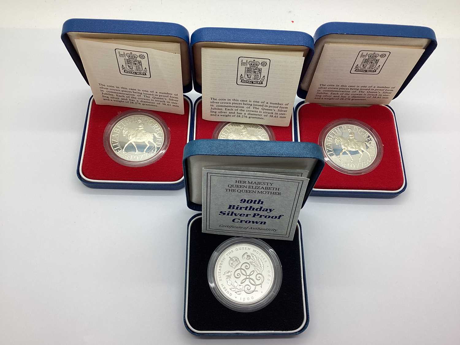 Lot 101 - Four Royal Mint Silver Proof Crowns, three...