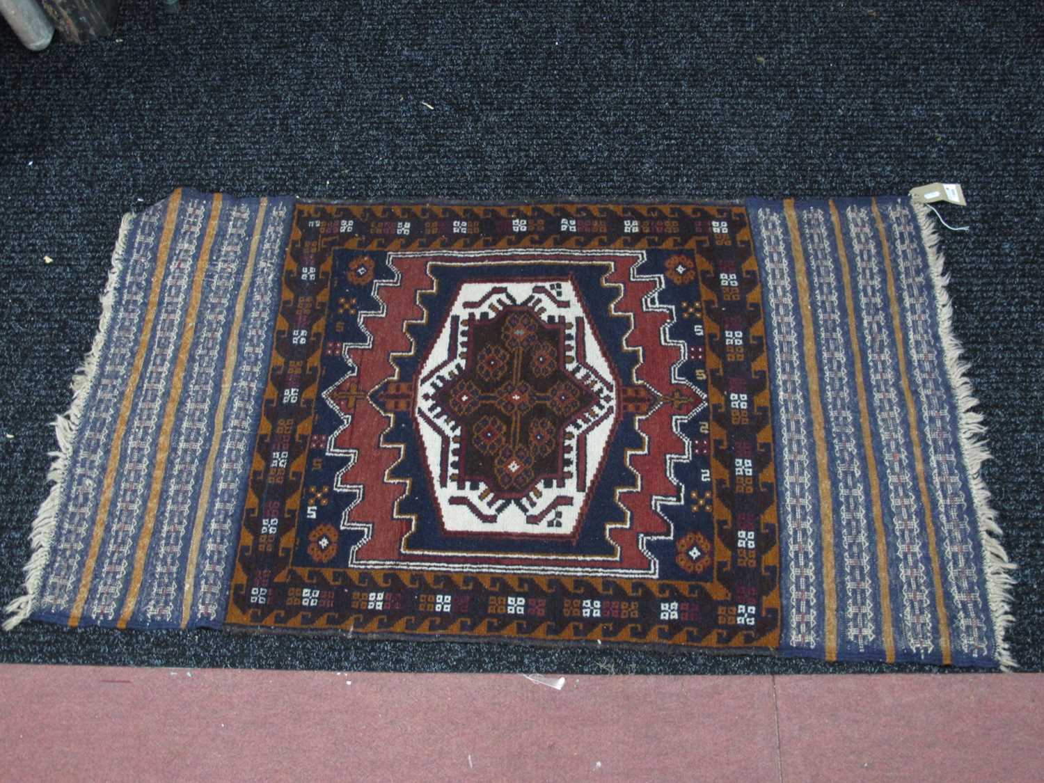 Lot 1569 - Middle Eastern Woold Tassled Rug, with...