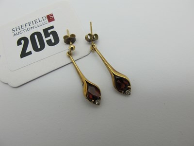 Lot 205 - A Pair of Garnet Set Drop Earrings, of sinuous...