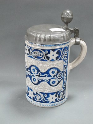 Lot 1070 - A German Westerwald Pottery Stein, decorated...