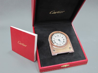 Lot 1179 - A Cartier Stainless Steel Desk Clock, with...