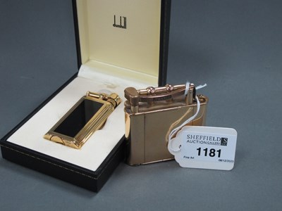 Lot 1181 - A Dunhill Black Enamel and Gold Plated Lighter,...