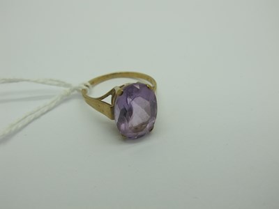 Lot 286 - A Large Amethyst Single Stone Ring, oval claw...