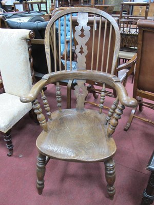 Lot 1552 - A XIX Century Ash and Elm Pad Arm Windsor...