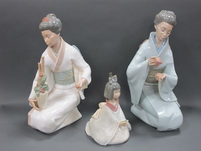 Lot 1050 - Two Nao Porcelain Figures of Japanese Ladies,...