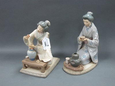 Lot 1089 - Two Lladro Figures, in traditional dress,...