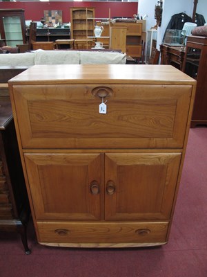 Lot 1600 - Ercol Cabinet, with a fall front over twin...