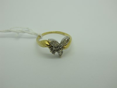 Lot 257 - A Modern Dress Ring, claw set mixed cut stones...