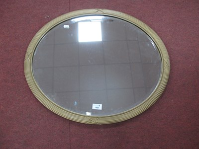 Lot 1461 - XX Century Gilt Oval Shaped Wall Mirror, with...