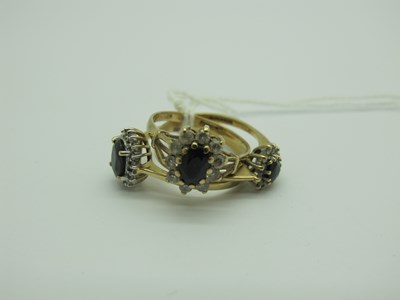 Lot 265 - Three 9ct Gold Cluster Rings, all claw set...