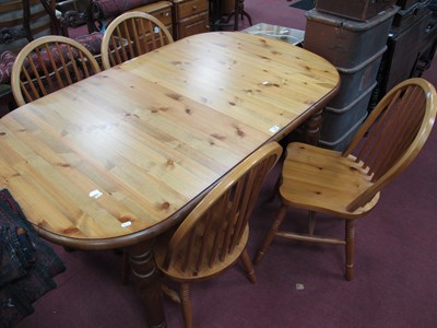 Lot 1570 - A Pine Oval Shaped Kitchen Table (with extra...