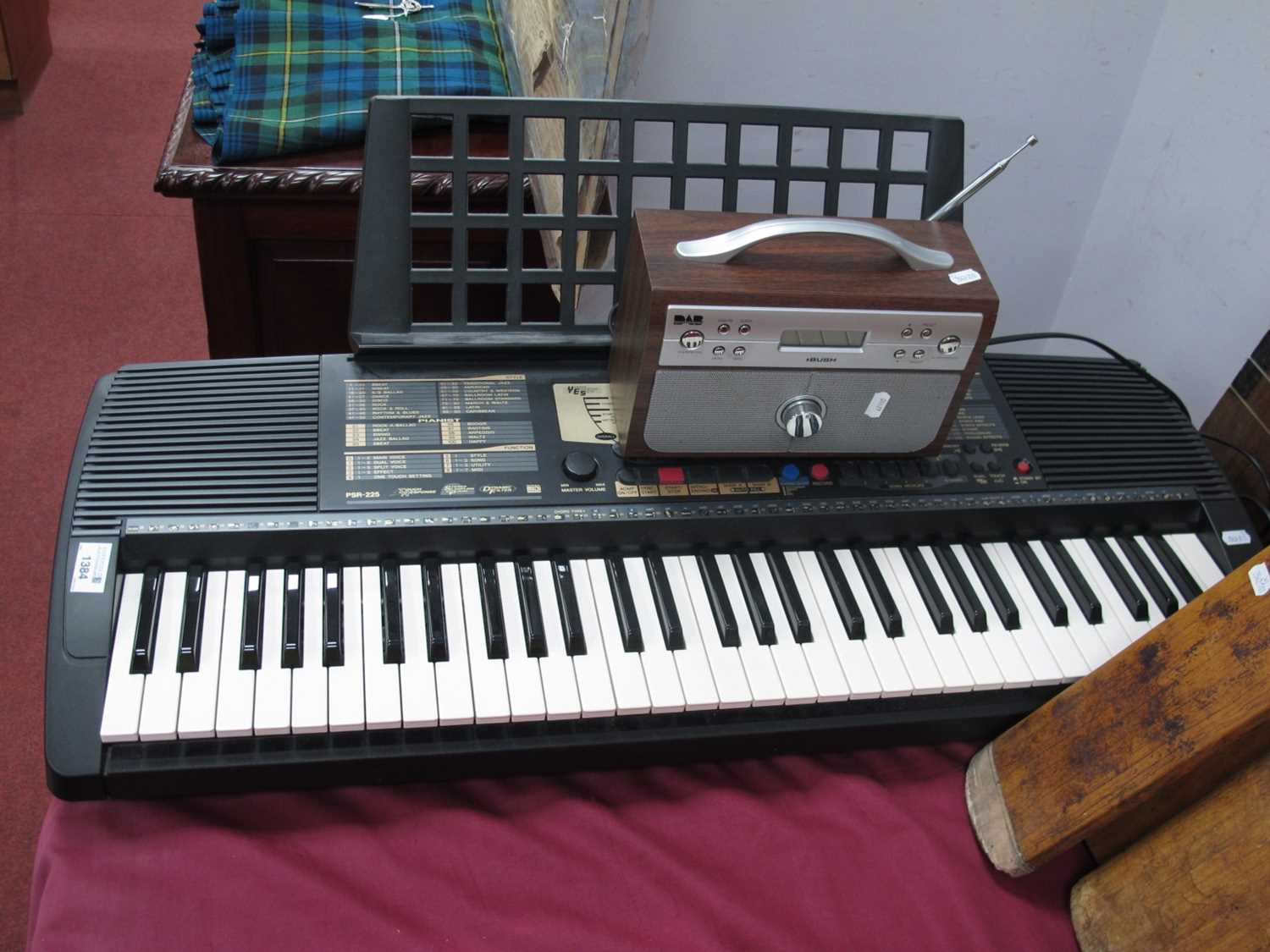 Lot 1384 - Yamaha PSR-225 Keyboard; together with a Bush...