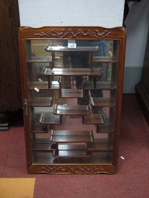 Lot 1543 - A Chinese Hardwood Wall Display Cabinet,...