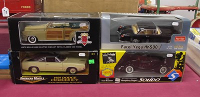 Lot 607 - Four Boxed 1:18th Scale Diecast Model Vehicles...