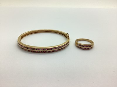 Lot 204 - A Modern 9ct Gold Hinged Bangle, two row...