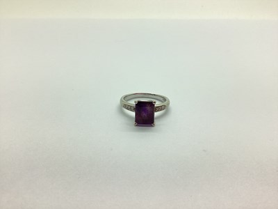 Lot 222 - A Modern Amethyst and Diamond Dress Ring,...