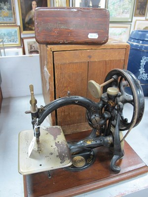 Lot 1449 - XX Century Wilcox & Gibbs sewing machine, New...