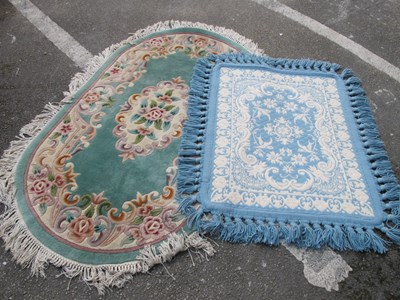 Lot 1664 - Rugs, to include one oblong in shape decorated...